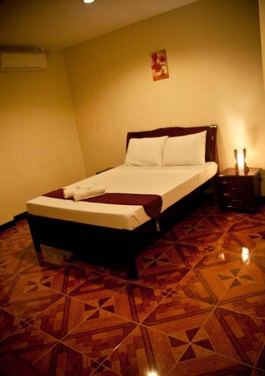Oro Bonito Place Tourist Inn Puerto Princesa Room photo